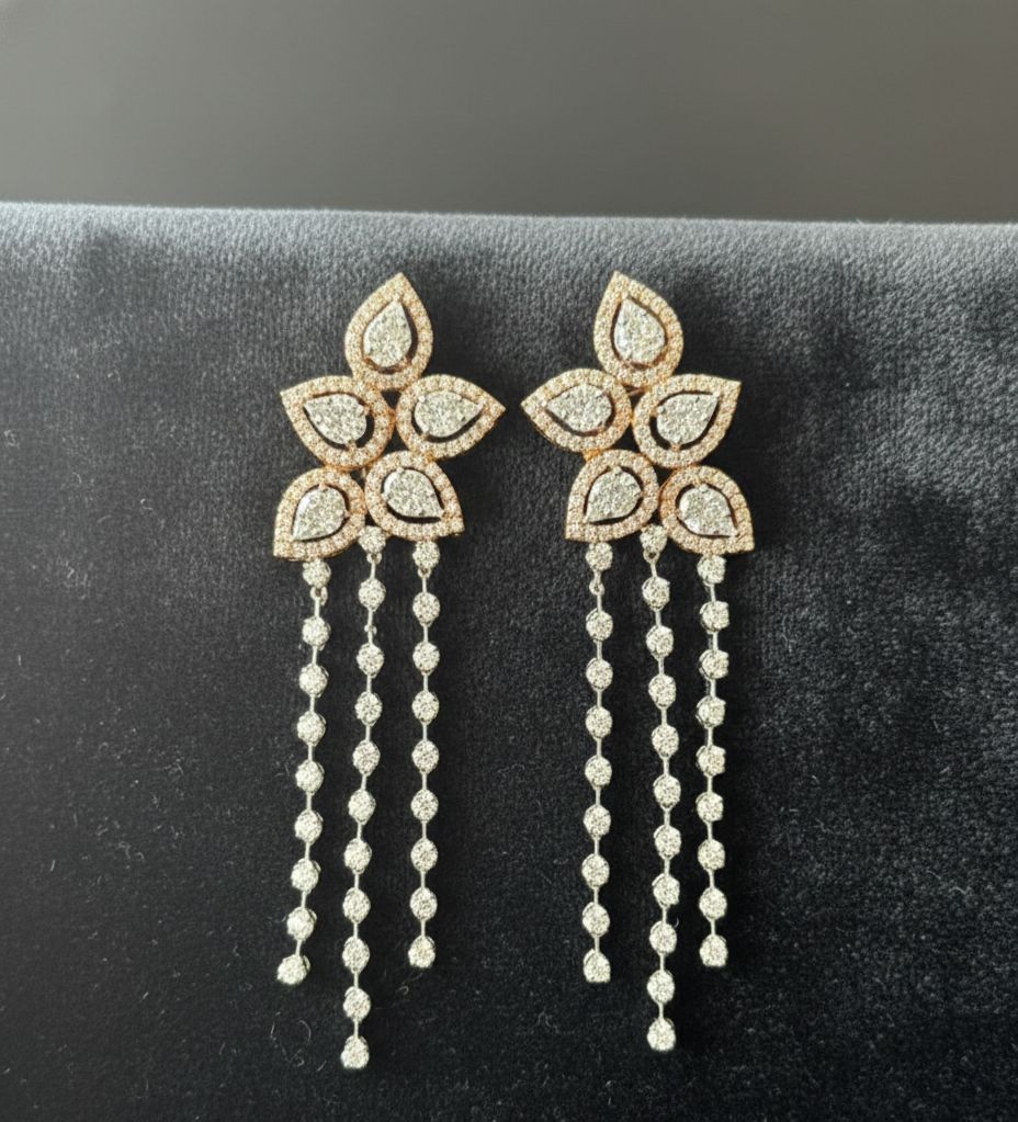 Multi-layered long necklace and matching floral chandelier earrings.