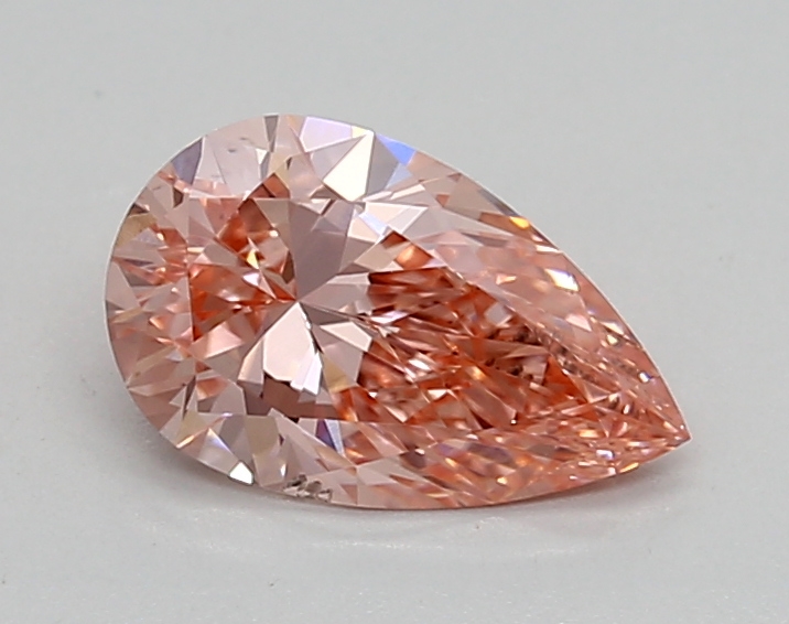 0.91ct FANCY VIVID  PINK SI1 Pear (IGI)