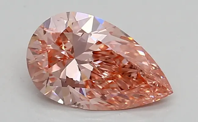 0.91ct FANCY VIVID  PINK SI1 Pear (IGI)