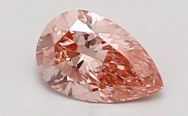 0.83ct FANCY VIVID  PINK VVS2 Pear (IGI)