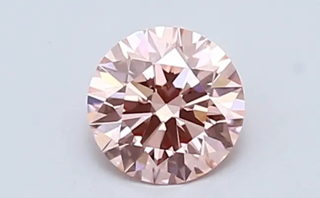 0.64ct FANCY INTENSE  PINK VVS2 Round (IGI)