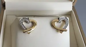 Sculpted Affection" 18K Two-Tone Gold Diamond Heart Studs (0.34ct DWT)