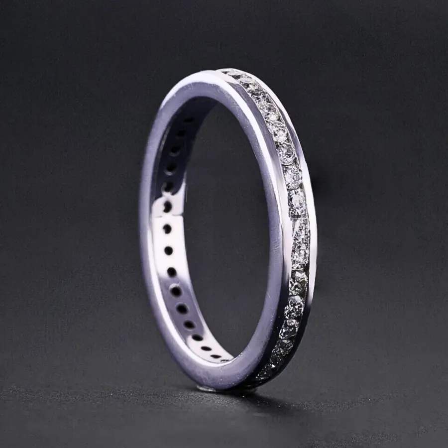 Channel Set Round Diamond Wedding Band.