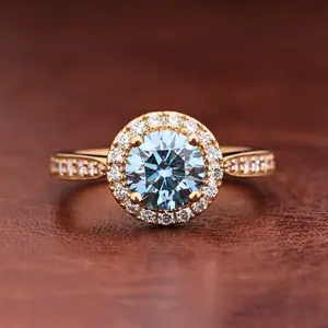 Blue Round Cut Lab Grown Diamond Halo Engagement Ring with Pave Band