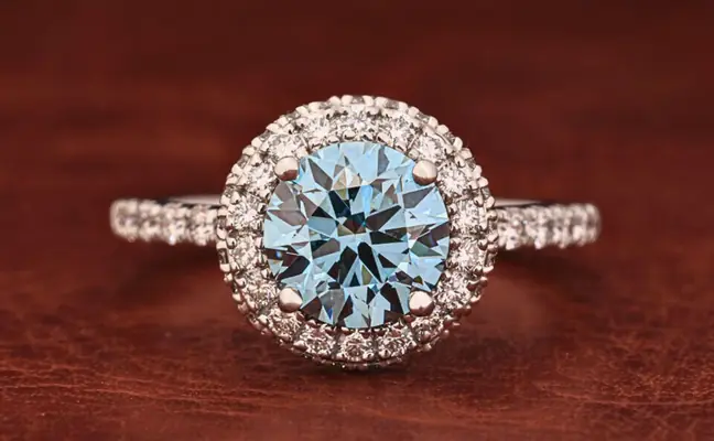 Blue Round Brilliant Cut Lab Grown Diamond Halo Engagement Ring with Pavé Shank