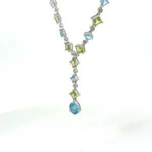 14K white gold, Diamond, Peridot, and Blue Topaz necklace