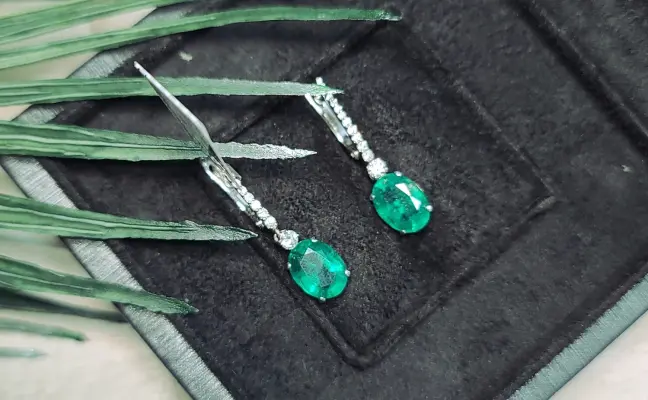 6.82 ct Emerald Oval Cut Earrings with Diamonds