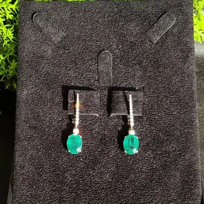 6.82 ct Emerald Oval Cut Earrings with Diamonds