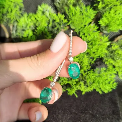 6.82 ct Emerald Oval Cut Earrings with Diamonds