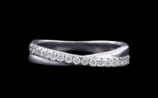 Sleek Curved Diamond Crossover Wedding Ring
