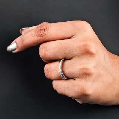 Sleek Curved Diamond Crossover Wedding Ring