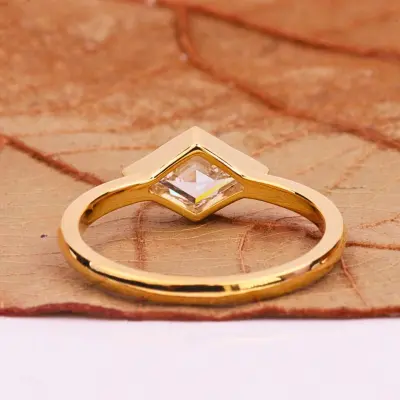 East-West Lozenge Cut Lab Grown Diamond Solitaire Ring in Bezel Setting