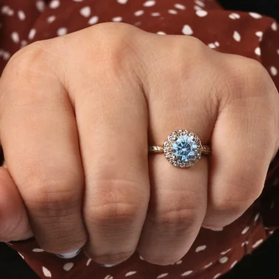 Blue Round Cut Lab Grown Diamond Halo Engagement Ring with Pave Band