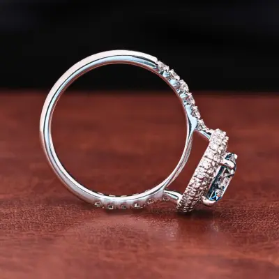 Blue Round Brilliant Cut Lab Grown Diamond Halo Engagement Ring with Pavé Shank