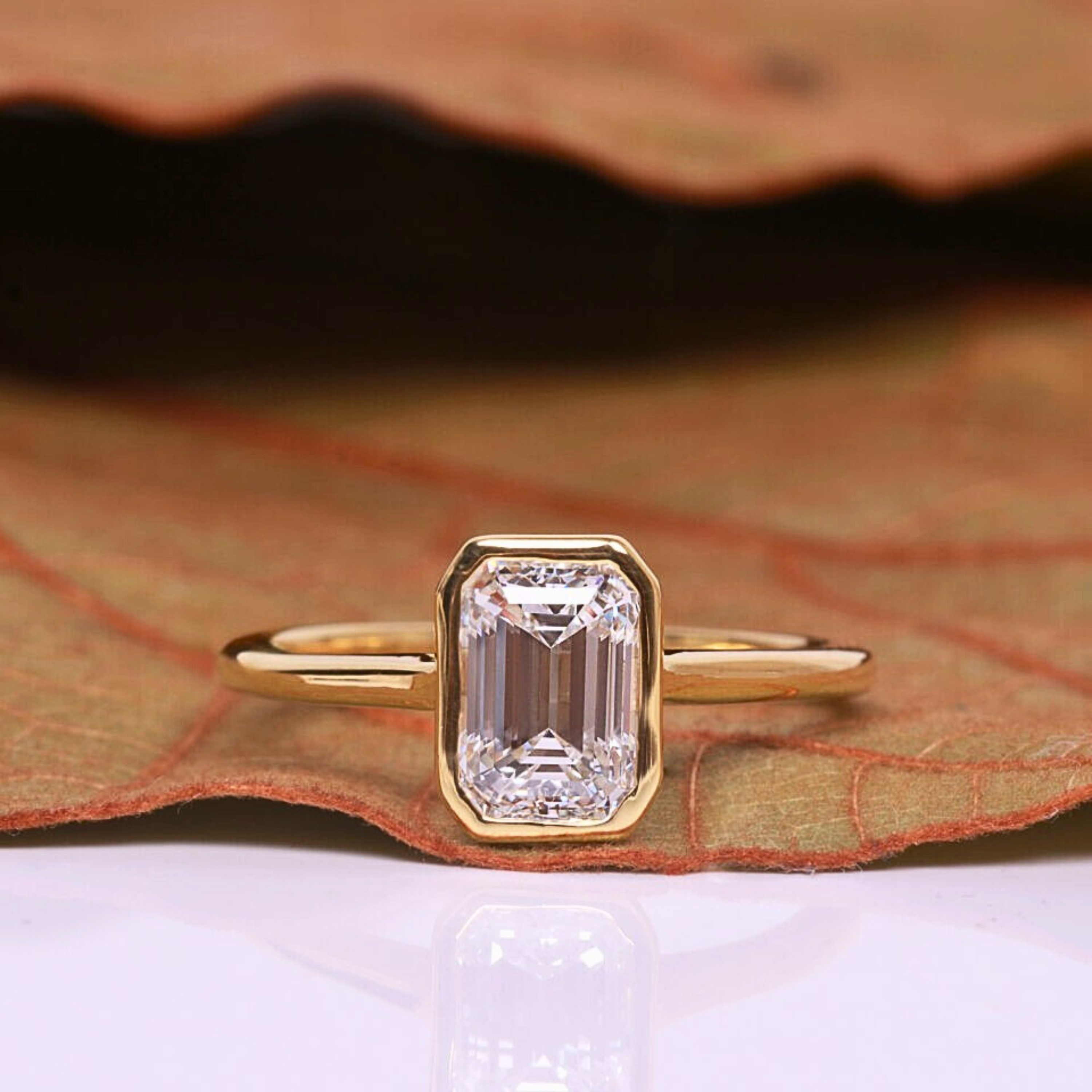 Emerald Cut Lab Grown Diamond Bezel Set Ring