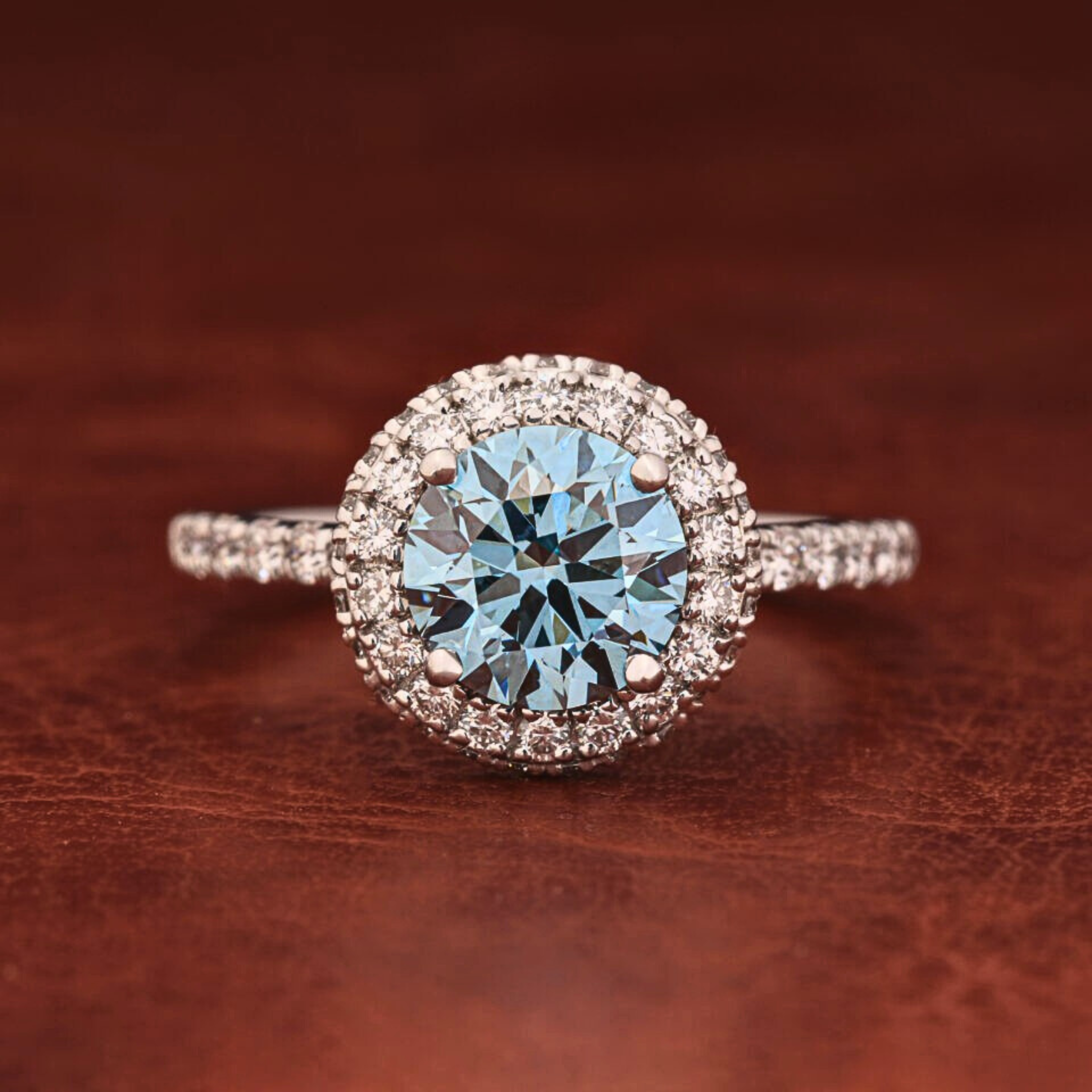 Blue Round Brilliant Cut Lab Grown Diamond Halo Engagement Ring with Pavé Shank