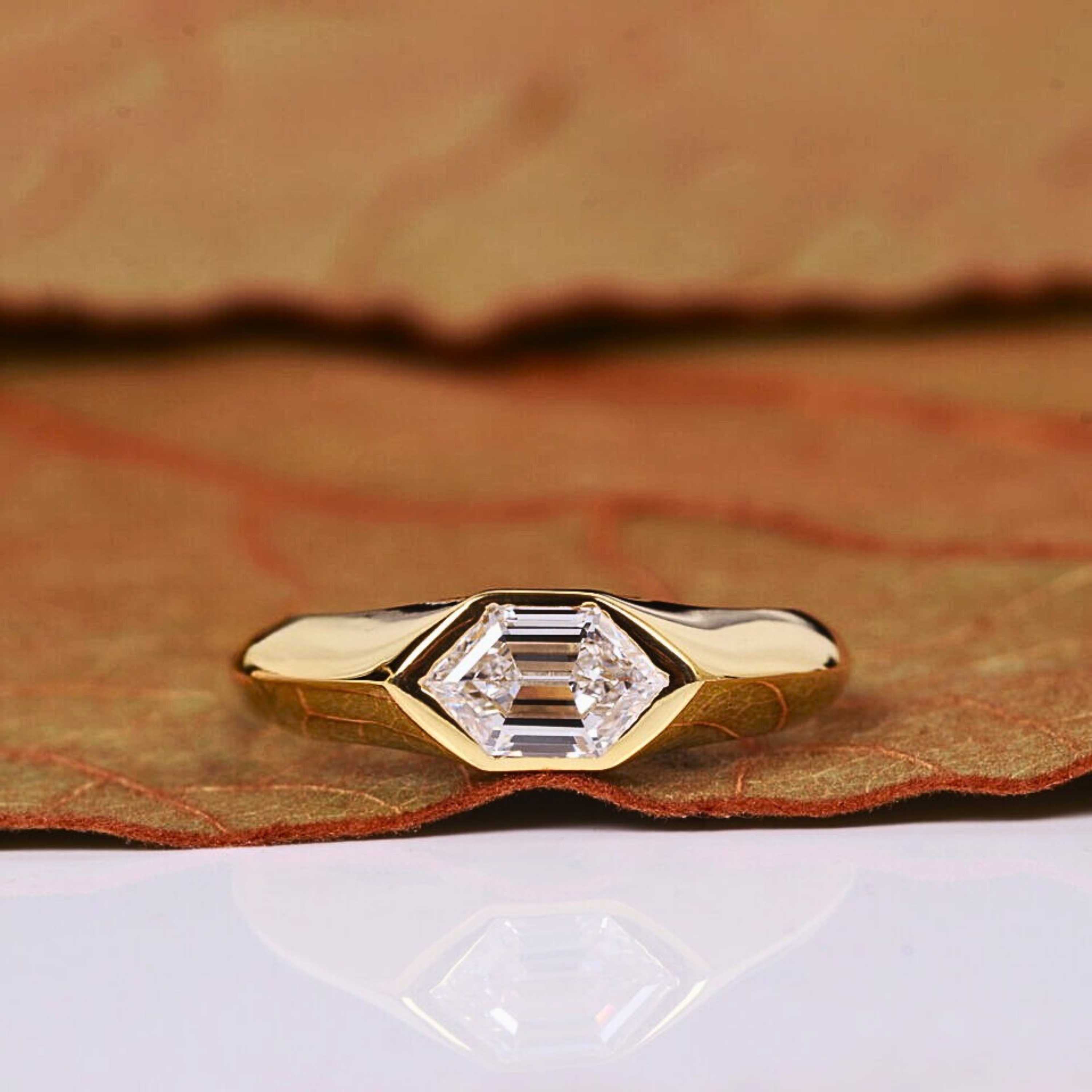 Long Hexagon Cut Lab Grown Diamond Solitaire Ring in Bezel Setting