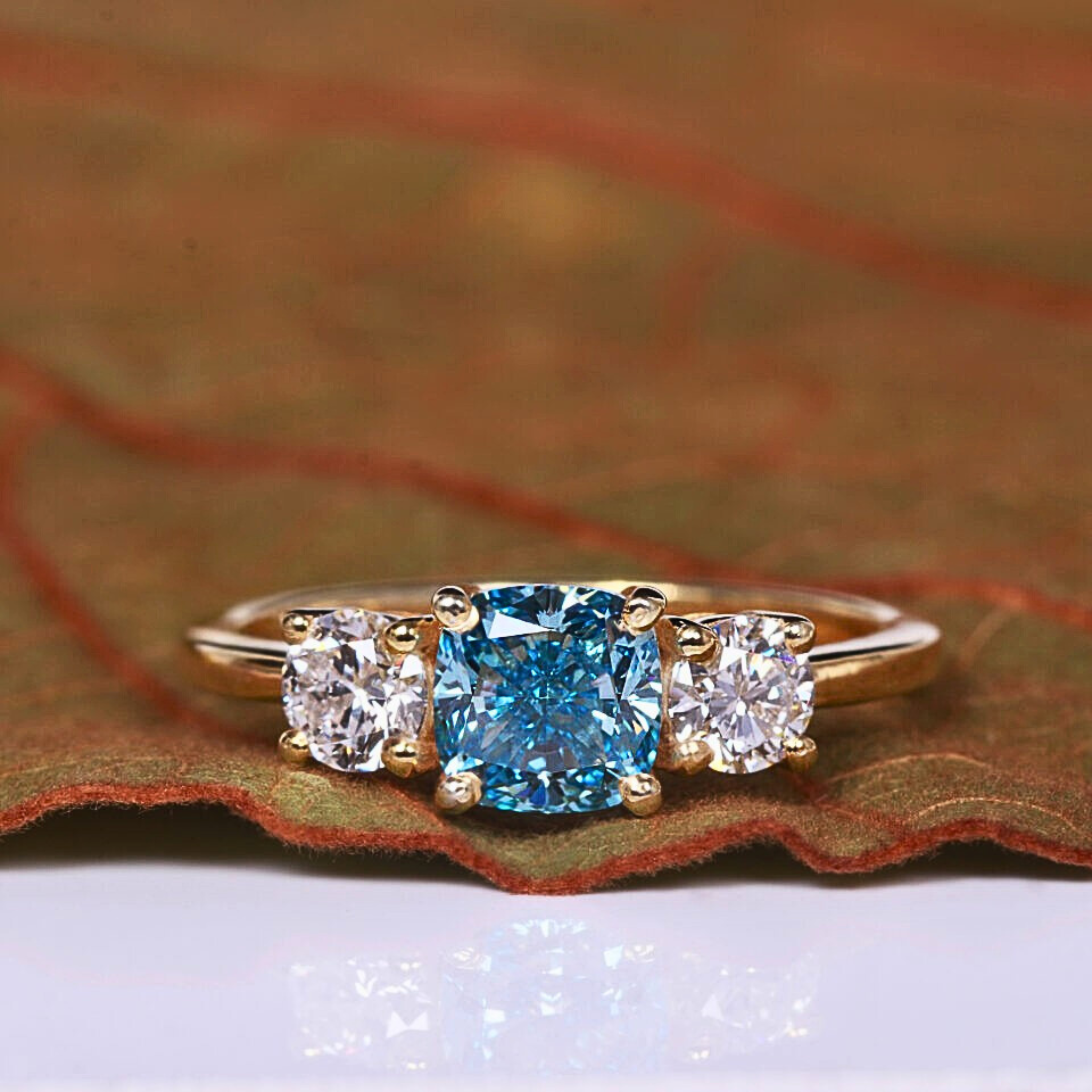 Blue Lab Grown Cushion Diamond Three Stone Ring