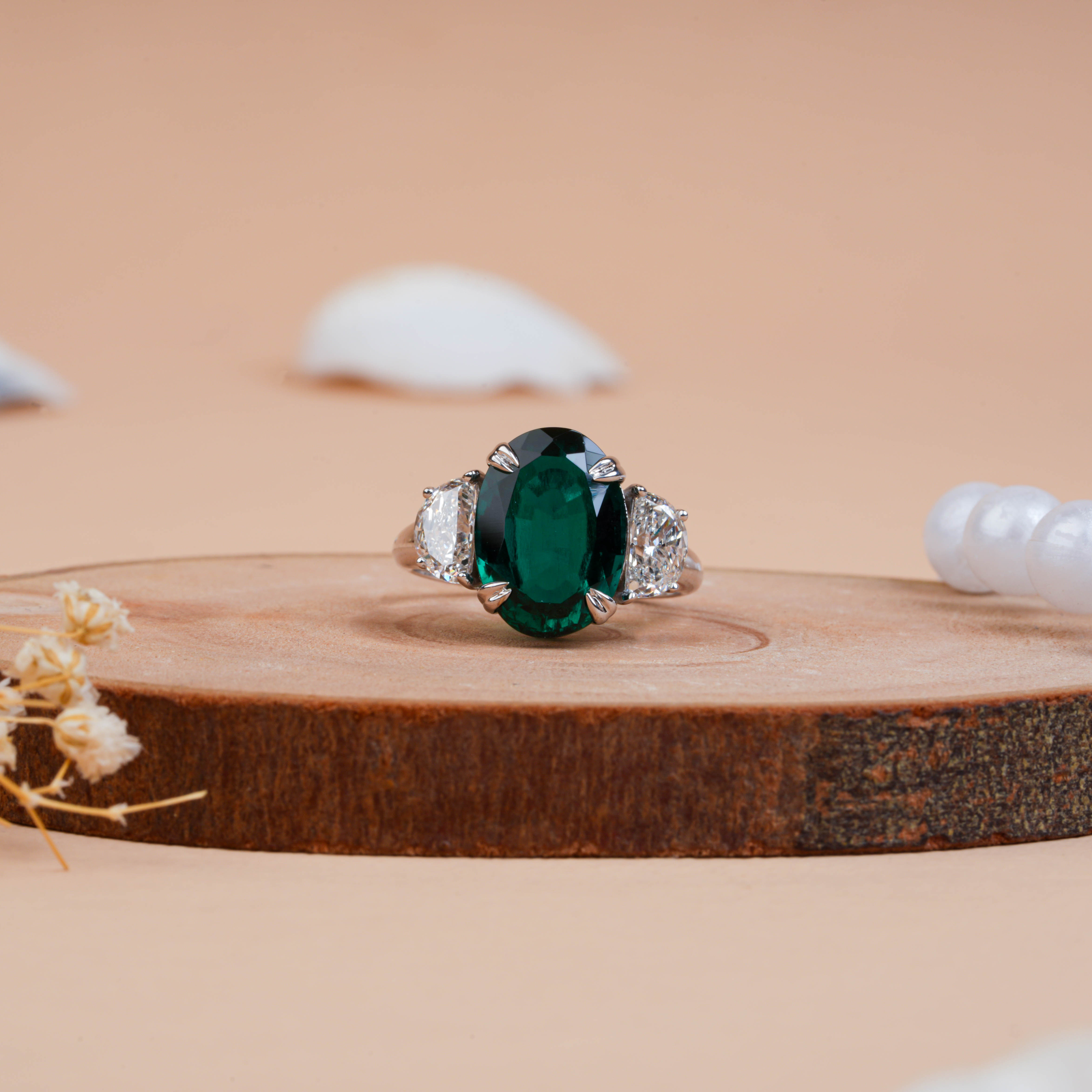 Oval Cut Emerald Lab Grown Diamond Engagement Ring